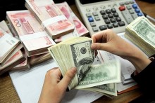 Trung Quốc có thể theo Thụy Sĩ bỏ neo tỷ giá
