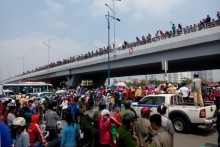 Striking workers block HCMC road